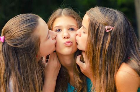 three girls kissing each